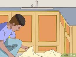 Kitchen cabinet handles are often not cleaned thoroughly while cleaning your kitchen. 3 Ways To Clean Greasy Kitchen Cabinets Wikihow