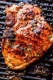 After about 1 to 2 minutes, open the lid, rotate the chop 45 degrees, and close the grill. Juicy Grilled Pork Chops How To Make The Best Grilled Pork Chops