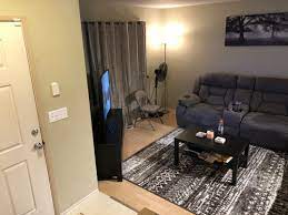 Long Living Room With 3 Walls