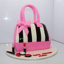 pink hand bag with makeup cake purse