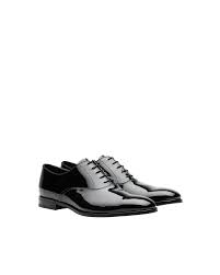 An oxford shoe is characterized by shoelace eyelets tabs that are attached under the vamp, a feature termed closed lacing. Patent Leather Oxford Shoes Prada