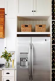 There is a small gap that will fit a webbing between the fridge and the floor. How To Clean A Refrigerator Both Inside And Out Better Homes Gardens