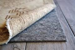 Image result for What type of pad is best under an area rug?