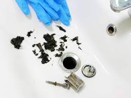 black stuff coming out of my sink drain