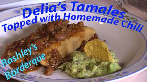 tamales topped with homemade chili