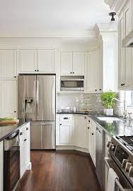 off white shaker cabinets with bronze