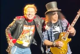 Watch: SLASH Accidentally Bumps Into AXL ROSE During GUNS N' ROSES Concert  In Brazil - BLABBERMOUTH.NET