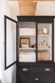 refinish a china cabinet for a bathroom