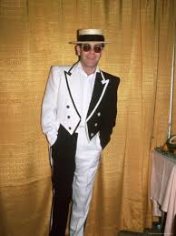 Editable illustration on white background. Singer And Songwriter Elton John In Black And White Tuxedo Wearing Sunglasses Premium Photographic Print David Mcgough Art Com