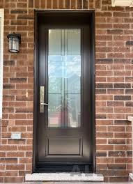 Brown Front Door With Decorative Glass