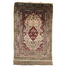 hereke silk rug with fringes