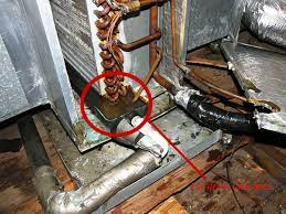 how to clear a clogged ac drain line