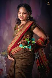 pregnancy photoshoot in saree with