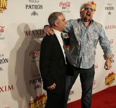 guy fieri defends new restaurant from