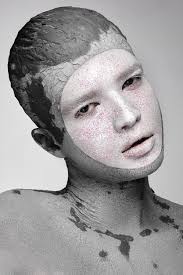 young man with art creative makeup with