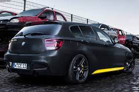 You should be able to get paint pencils of schwarz at the parts department of your local bmw dealer. Manhart Mh1 400 Tuning Fur Bmw M135i 405 Ps Sperrdifferenzial