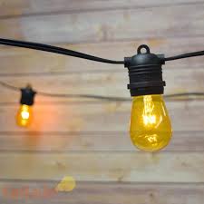 24 Socket Outdoor Commercial String Light Set S14 Yellow Colored Light Bulbs 54 Ft Black Cord Weatherproof On Sale Now String Lights At Paperlanternstore