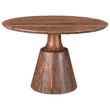 Rustic barnwood and log dining bradley's is pleased to offer the largest selection of rustic dining room sets in the state. Coast To Coast Imports Brownstone Rustic Round Dining Table With Pedestal Base Zak S Home Dining Tables