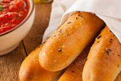 What is the best way to reheat Olive Garden breadsticks?
