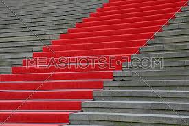 red carpet over concrete stairs