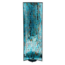 Wall sconces are a decorative addition to a room, and they also provide using one large and two smaller candle wall sconces, create a focal point. 24in Blue Mosaic Wall Sconce At Home