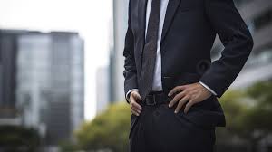 businessman in suit standing in city