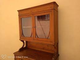 antique cupboard with glass doors for