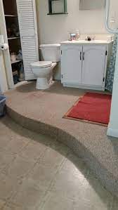 The planks are available in a variety of core materials, but the most common are spc (stone plastic composite), wpc (wood plastic composite) or a hybrid variation. Vinyl Or Tile For Raised Curved Basement Bathroom Floor