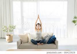 yoga sofa home training stock photo