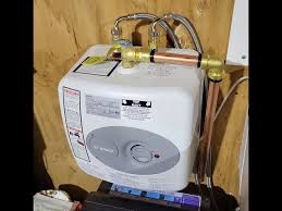 best mini water heater for barns or