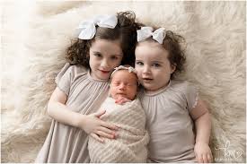 newborn baby three stunning
