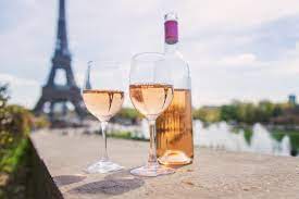 Wine In A Glass Near The Eiffel Tower