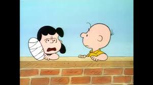 charlie brown kicks the out of