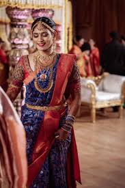 south indian bride in a navy blue saree