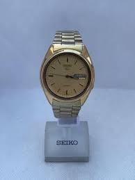 seiko 5 gold dial automatic 21 jewels