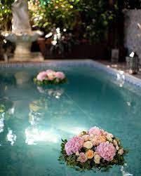 Floating flowers for pool wedding. 21 Wedding Pool Party Decoration Ideas For Your Backyard Wedding