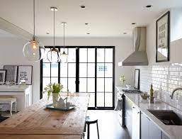 Sinks and other counter tops will usually have recessed lights or under cabinet lighting. Symphony In Neutrals May 2015 Lonny Kitchen Lighting Over Table Farmhouse Kitchen Design Home Kitchens