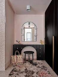 black closet with black vanity table