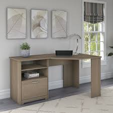 A matte, ash grey finish adds rustic refinement to this polished piece, which is outfitted with metal inset pulls with an antiqued nickel finish. Bush Furniture Cabot 60w Corner Desk With Storage In Ash Gray Wc31215k