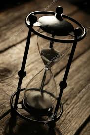vintage black hourglass stock photo by
