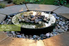 Pebble Pool Fountain Stock Photo By