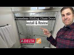 delta frameless shower door