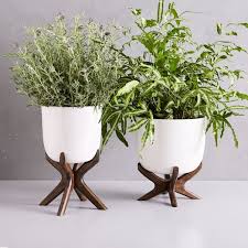 Have y'all seen these modern/mid century plant stands? Wright Standing Planters