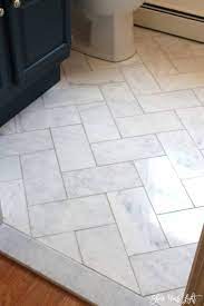 large herringbone marble tile floor