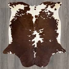 brown white cowhide rug co5223