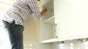repairing kitchen cupboard door hinge