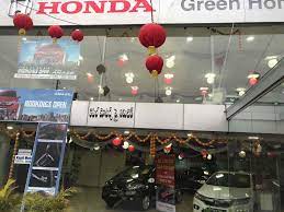 green honda car showroom in malakpet