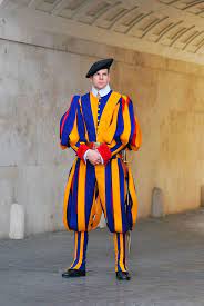 This style of gala uniform has been worn by swiss guards since 1910. The Dopest Military Uniforms Throughout History From Around The World Swiss Guard Military Uniform Men In Uniform