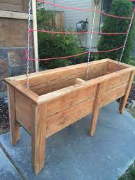Since the porch doesn't have a lot of room we are making the planter so that it can be attached. Planter Box Made Out Of 5 Stained Fence Pickets Using A Table Saw A Couple Screws 1 1 2 Hours Of Labor Redwood Planter Boxes Planter Boxes Diy Planter Box