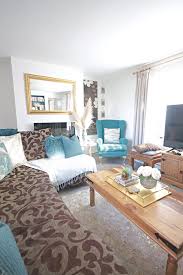 our teal and gold living room one